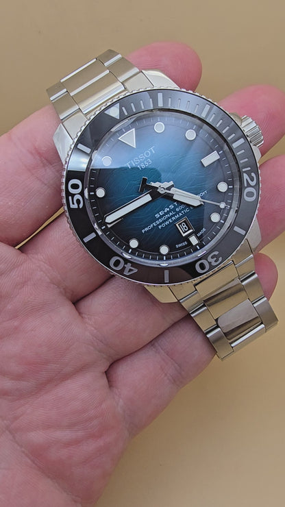 Tissot Seastar 2000 Ceramic 600m Powermatic80 46mm cutie/acte